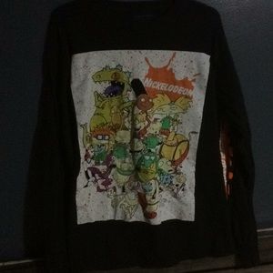 It’s a black Nickelodeon kind sleeve shirt